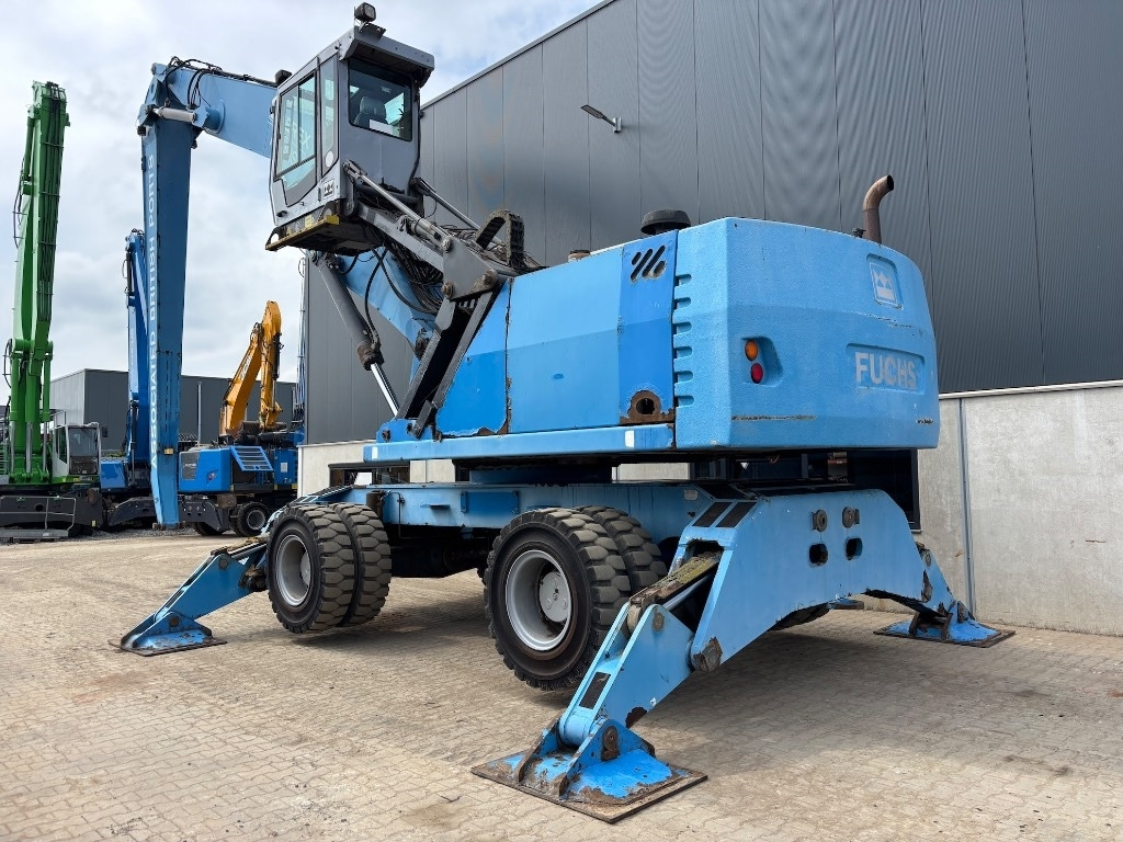 Fuchs MHL 380 - Багер за манипулиране на материали: снимка 1 Fuchs MHL 380 - Багер за манипулиране на материали: снимка 1