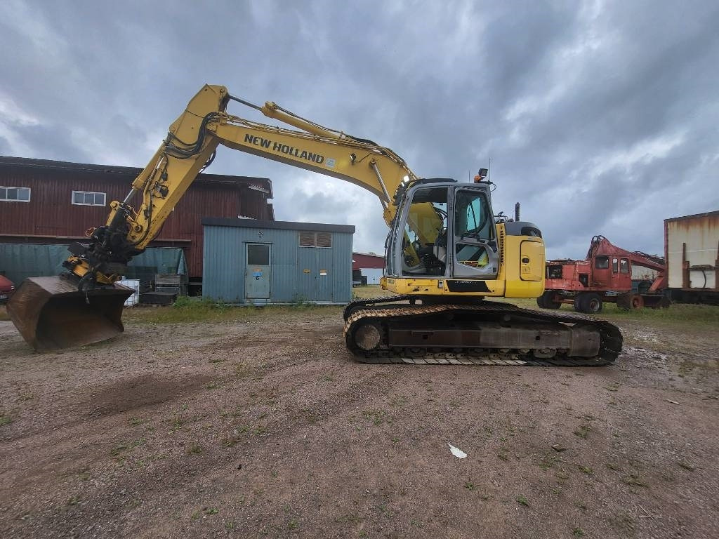 New Holland Kobelco E 235 B SR-2 - Верижен багер: снимка 2 New Holland Kobelco E 235 B SR-2 - Верижен багер: снимка 2