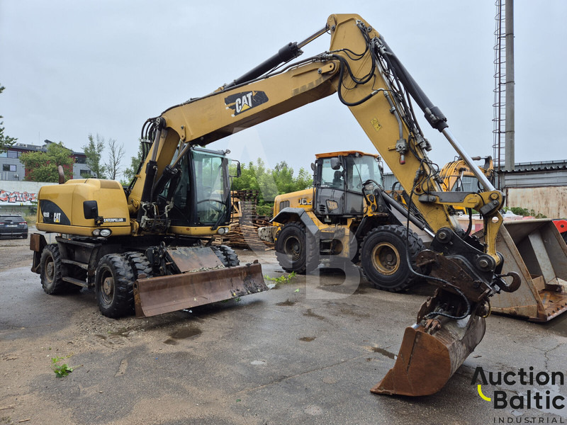 Caterpillar M 315 D - Колесен багер: снимка 2 Caterpillar M 315 D - Колесен багер: снимка 2