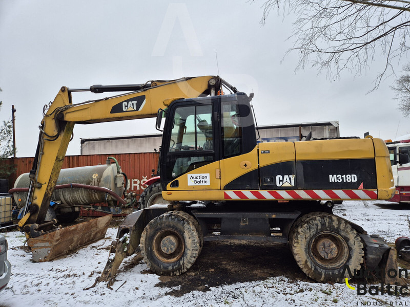Caterpillar M 318 D - Колесен багер: снимка 1 Caterpillar M 318 D - Колесен багер: снимка 1