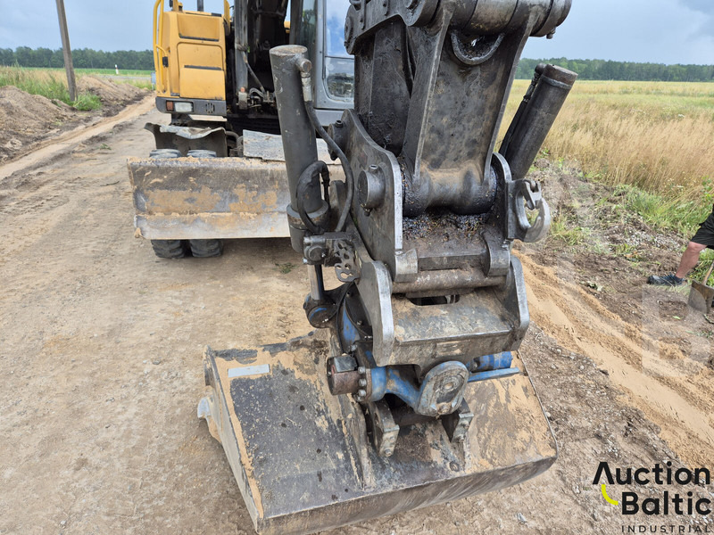 Колесен багер Volvo EW 140 C: снимка 6