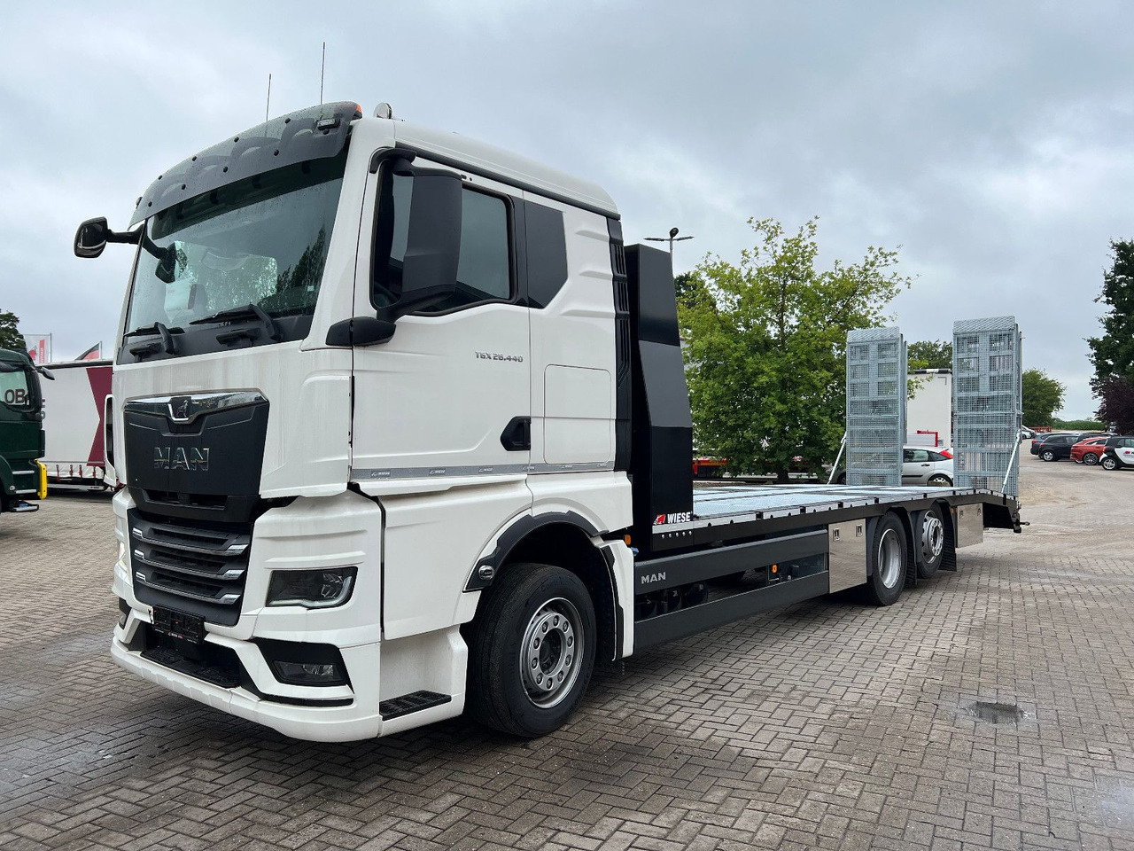 MAN Baumaschinen-  Arbeitsbühnentransporter Rampen - Камион пътна помощ: снимка 3 MAN Baumaschinen-  Arbeitsbühnentransporter Rampen - Камион пътна помощ: снимка 3