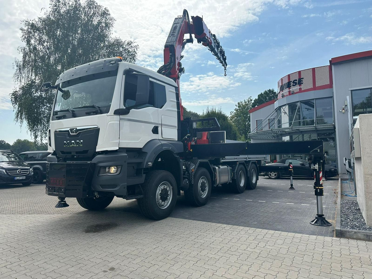 MAN TGS 41.520 8x8 mit Fassi Ladekran F710RA.2.26 - Бордови камион: снимка 2 MAN TGS 41.520 8x8 mit Fassi Ladekran F710RA.2.26 - Бордови камион: снимка 2