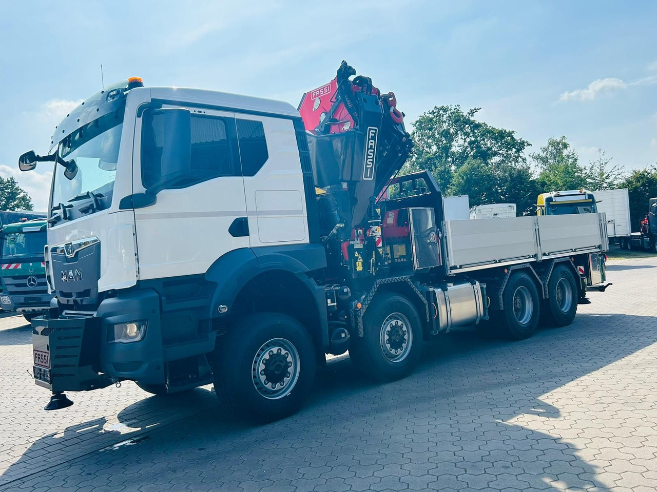 MAN TGS 41.520 8x8 mit Fassi Ladekran F710RA.2.26 - Бордови камион: снимка 5 MAN TGS 41.520 8x8 mit Fassi Ladekran F710RA.2.26 - Бордови камион: снимка 5