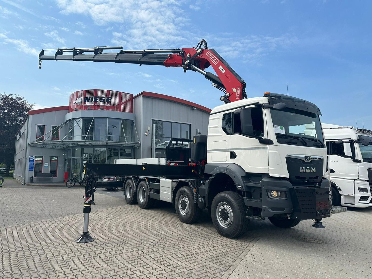 MAN TGS 41.520 8x8 mit Fassi Ladekran F710RA.2.26 - Бордови камион: снимка 1 MAN TGS 41.520 8x8 mit Fassi Ladekran F710RA.2.26 - Бордови камион: снимка 1
