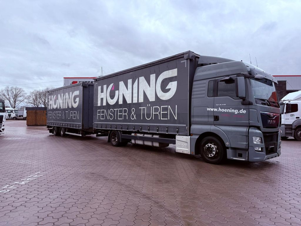 MAN TGX 18.440 LL Volumen LKW mit Staplerhalterung - Камион с брезент: снимка 1 MAN TGX 18.440 LL Volumen LKW mit Staplerhalterung - Камион с брезент: снимка 1