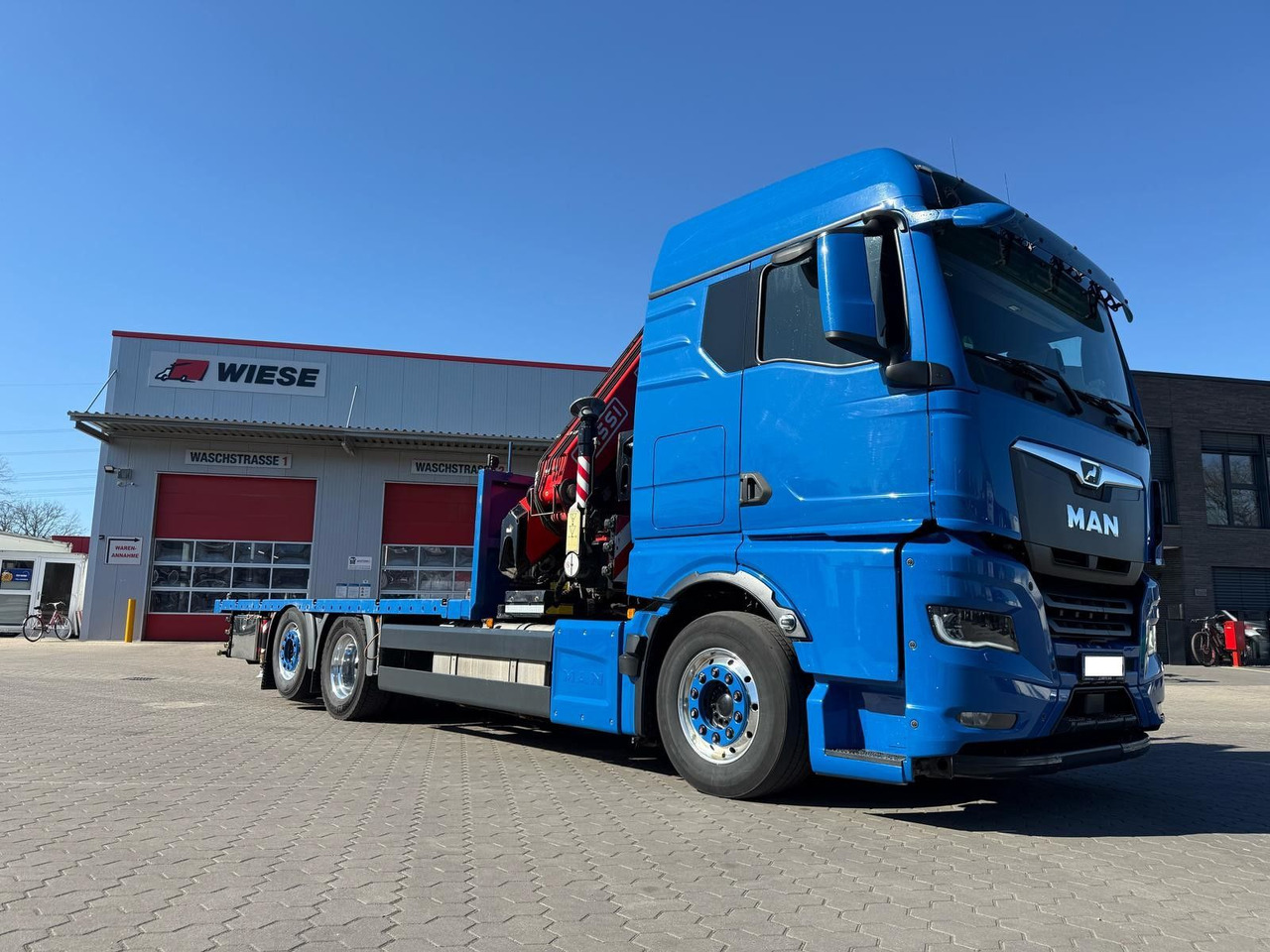 MAN TGX 26.640 mit Fassi F365A2.26 Containerpritsche - Камион с кран: снимка 1 MAN TGX 26.640 mit Fassi F365A2.26 Containerpritsche - Камион с кран: снимка 1