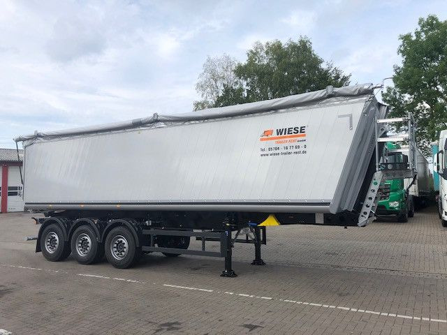 Schmitz Cargobull Kipper 52m³ mit gekröpftem Chassis - Самосвал полуремарке: снимка 1 Schmitz Cargobull Kipper 52m³ mit gekröpftem Chassis - Самосвал полуремарке: снимка 1