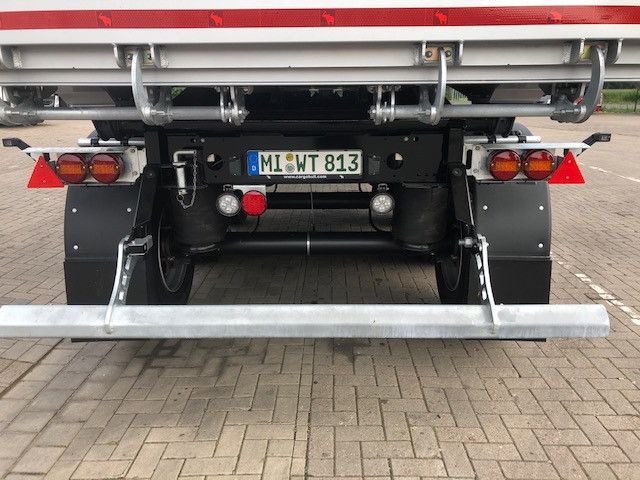 Schmitz Cargobull Kipper 52m³ mit gekröpftem Chassis - Самосвал полуремарке: снимка 4 Schmitz Cargobull Kipper 52m³ mit gekröpftem Chassis - Самосвал полуремарке: снимка 4
