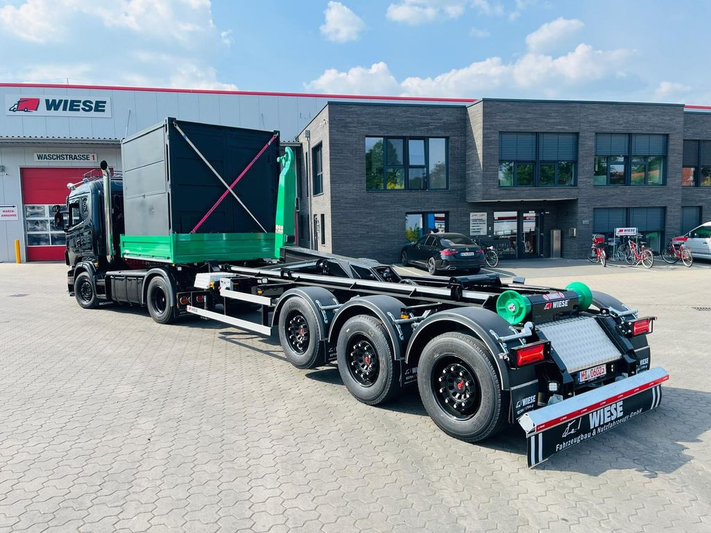 Wiese Hakenliftauflieger Abrollkipper Hooklift - Контейнеровоз/ Сменна каросерия полуремарке: снимка 1 Wiese Hakenliftauflieger Abrollkipper Hooklift - Контейнеровоз/ Сменна каросерия полуремарке: снимка 1