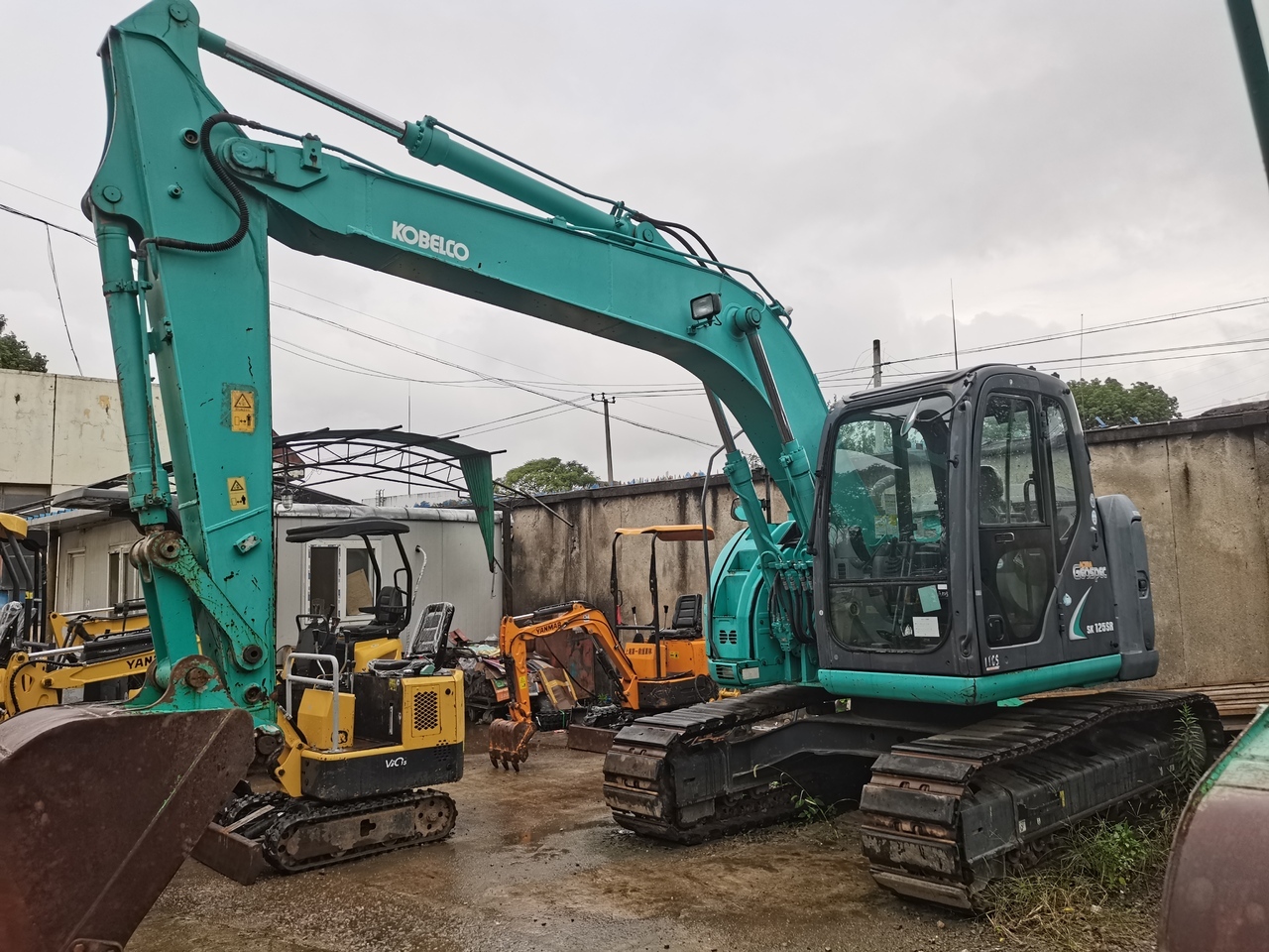 KOBELCO SK125SR - Верижен багер: снимка 1 KOBELCO SK125SR - Верижен багер: снимка 1