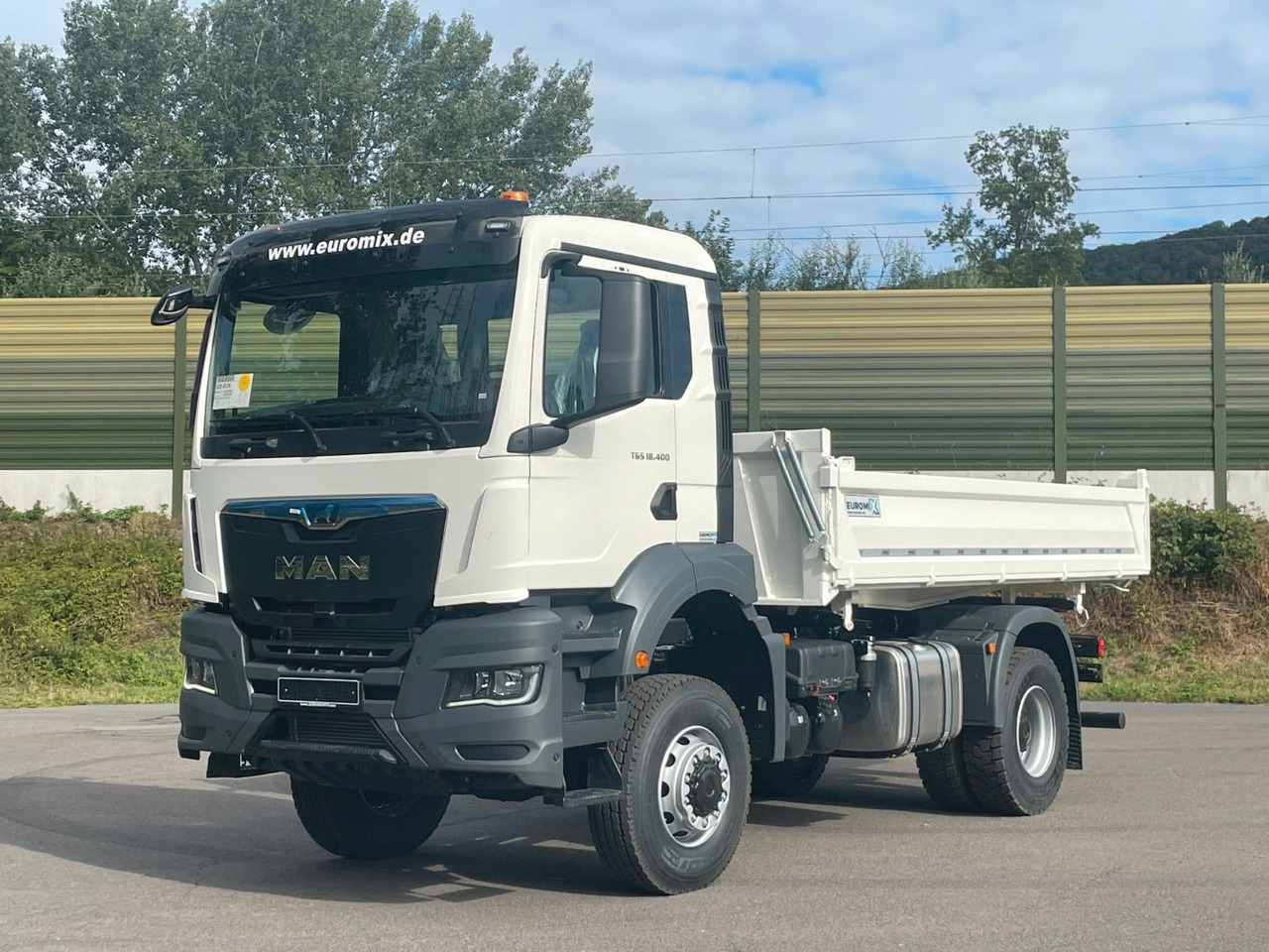 MAN TGS 18.400 TG3 4x4 Euro6e 3-Seiten-Kippe Euromix - Самосвал камион: снимка 1 MAN TGS 18.400 TG3 4x4 Euro6e 3-Seiten-Kippe Euromix - Самосвал камион: снимка 1