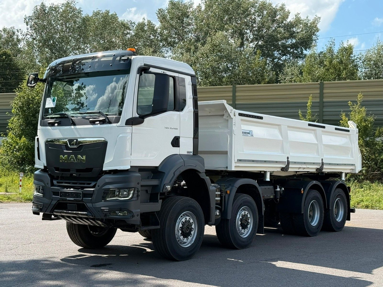 MAN TGS 35.480 8x8 EuromixMTP 3-Seiten-Kipper - Самосвал камион: снимка 2 MAN TGS 35.480 8x8 EuromixMTP 3-Seiten-Kipper - Самосвал камион: снимка 2