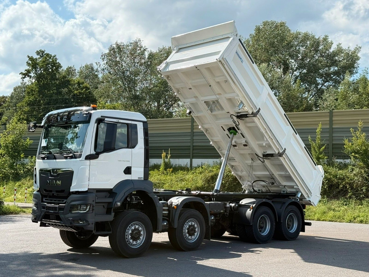 MAN TGS 35.480 8x8 EuromixMTP 3-Seiten-Kipper - Самосвал камион: снимка 1 MAN TGS 35.480 8x8 EuromixMTP 3-Seiten-Kipper - Самосвал камион: снимка 1