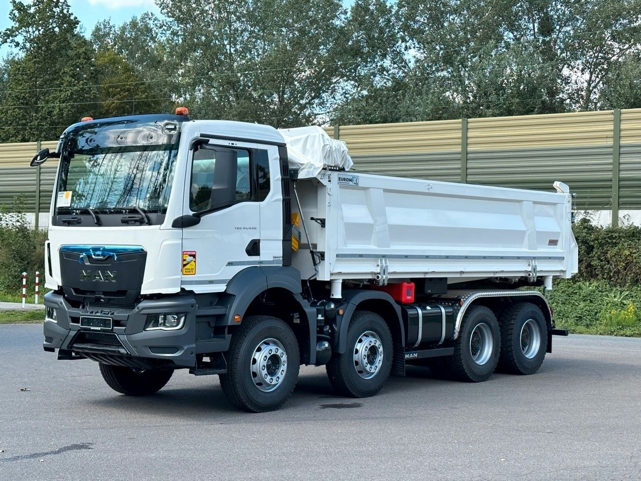MAN TGS 41.440 8x4 EuromixMTP 3-Seiten-Kipper - Самосвал камион: снимка 1 MAN TGS 41.440 8x4 EuromixMTP 3-Seiten-Kipper - Самосвал камион: снимка 1