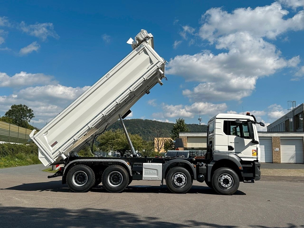 Лизинг на  MAN TGS 41.440  8x4 EuromixMTP 3-Seiten-Kipper MAN TGS 41.440  8x4 EuromixMTP 3-Seiten-Kipper: снимка 11
