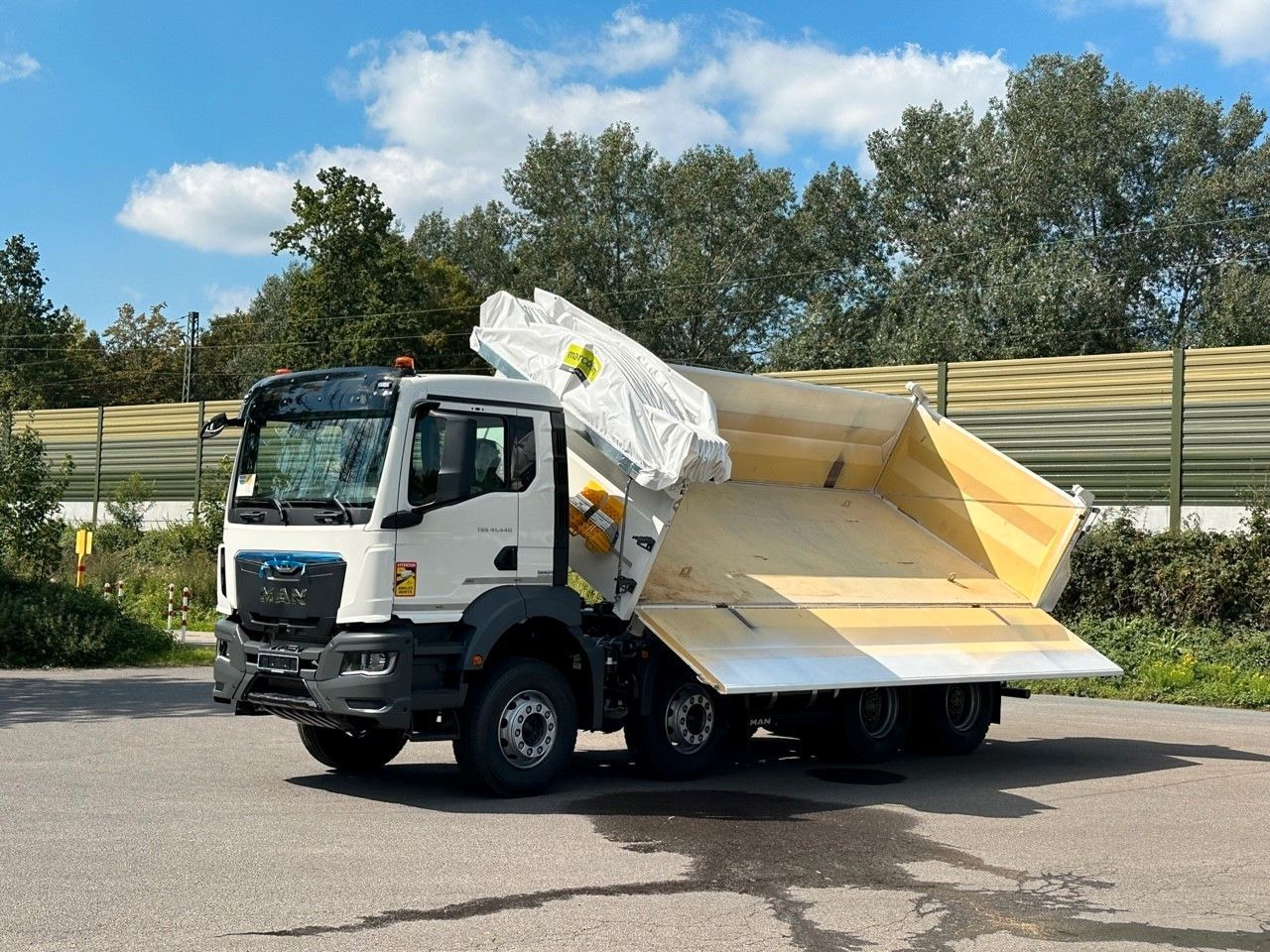 Лизинг на  MAN TGS 41.440  8x4 EuromixMTP 3-Seiten-Kipper MAN TGS 41.440  8x4 EuromixMTP 3-Seiten-Kipper: снимка 14