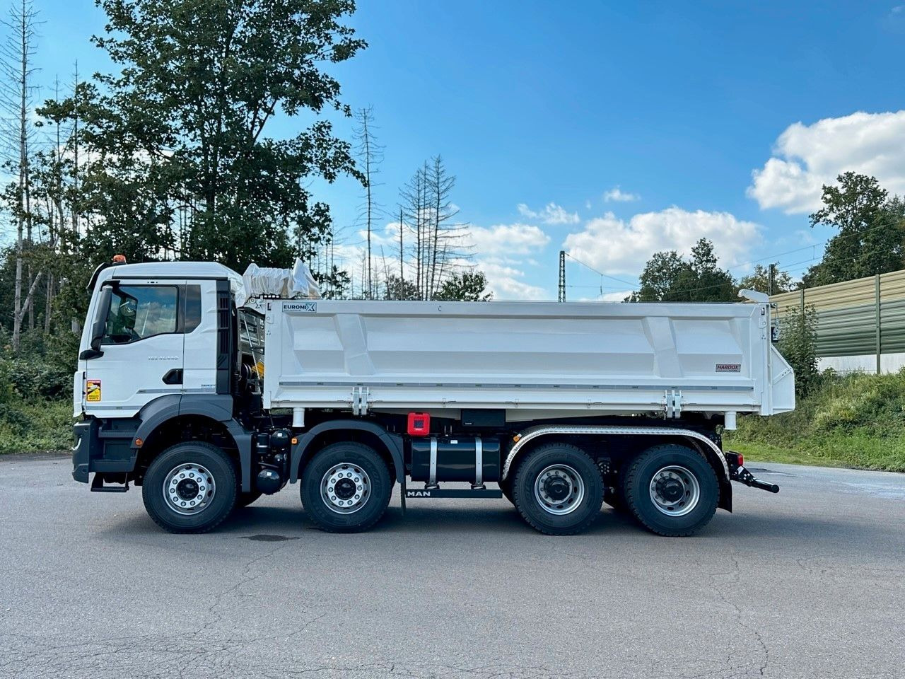 MAN TGS 41.440 8x4 EuromixMTP 3-Seiten-Kipper - Самосвал камион: снимка 2 MAN TGS 41.440 8x4 EuromixMTP 3-Seiten-Kipper - Самосвал камион: снимка 2