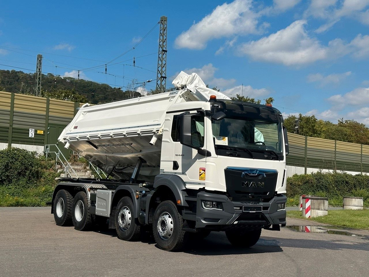 Лизинг на  MAN TGS 41.440  8x4 EuromixMTP 3-Seiten-Kipper MAN TGS 41.440  8x4 EuromixMTP 3-Seiten-Kipper: снимка 19