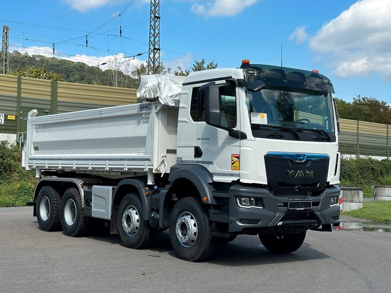 Лизинг на  MAN TGS 41.440  8x4 EuromixMTP 3-Seiten-Kipper MAN TGS 41.440  8x4 EuromixMTP 3-Seiten-Kipper: снимка 6