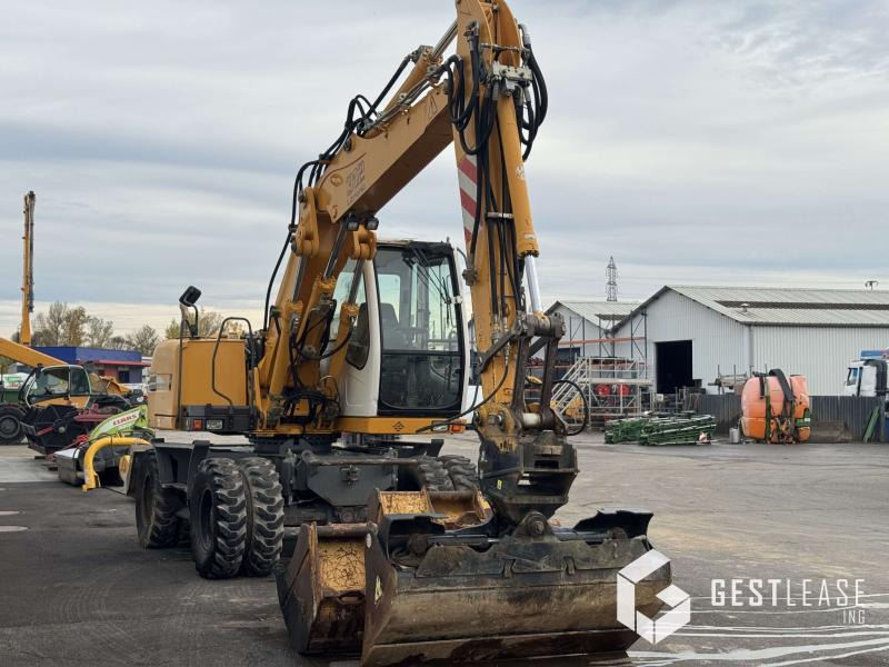 Liebherr A312 Litronic - Колесен багер: снимка 4 Liebherr A312 Litronic - Колесен багер: снимка 4