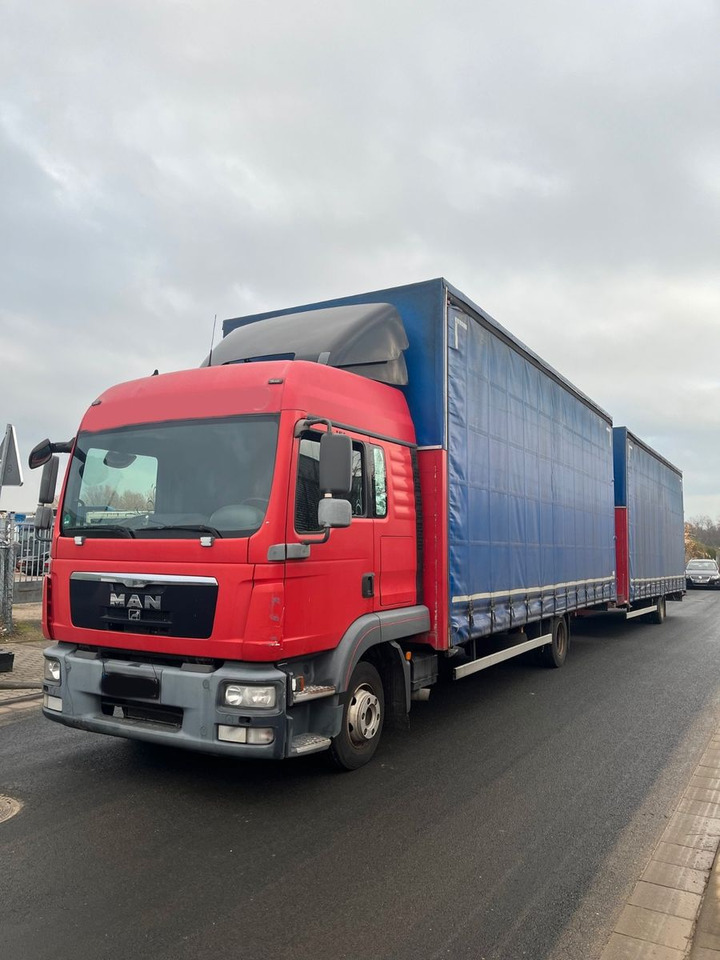 MAN 8.220 4X2 Pritschenwagen - Камион с брезент: снимка 1 MAN 8.220 4X2 Pritschenwagen - Камион с брезент: снимка 1