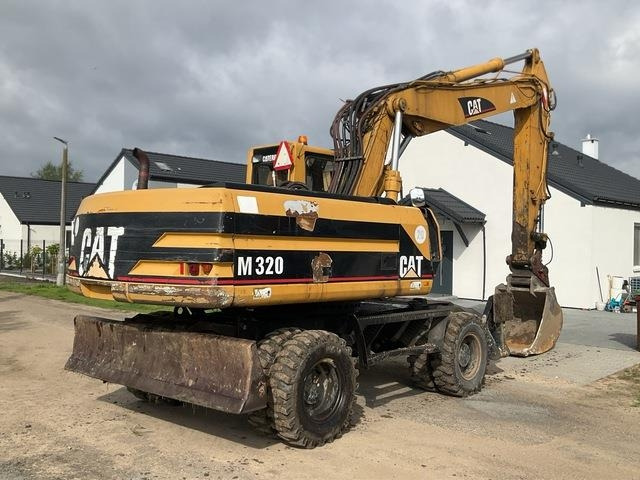 CAT M320 - Колесен багер: снимка 4 CAT M320 - Колесен багер: снимка 4