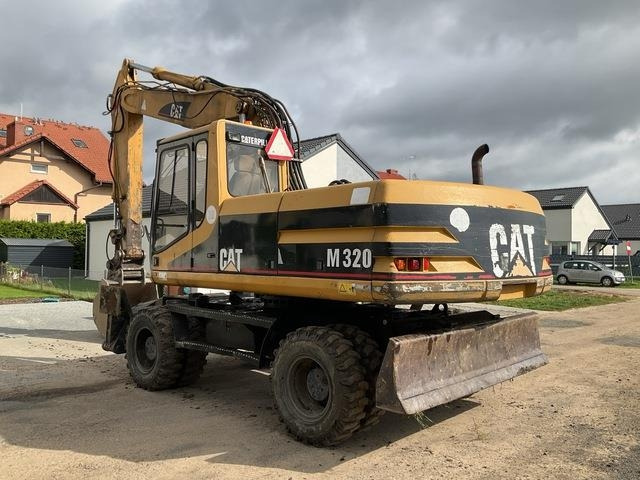 CAT M320 - Колесен багер: снимка 3 CAT M320 - Колесен багер: снимка 3