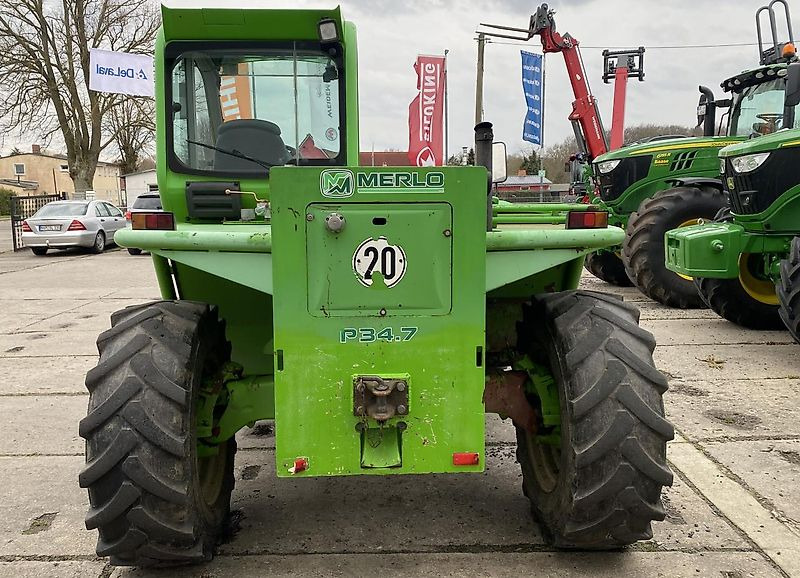 Телескопичен товарач Merlo P34.7 mit Palettengabel: снимка 6
