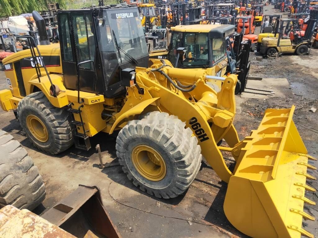 Caterpillar 966 H - Колесен товарач: снимка 1 Caterpillar 966 H - Колесен товарач: снимка 1