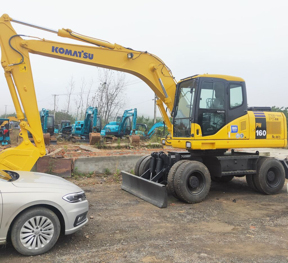 Komatsu PW160 - Колесен багер: снимка 1 Komatsu PW160 - Колесен багер: снимка 1