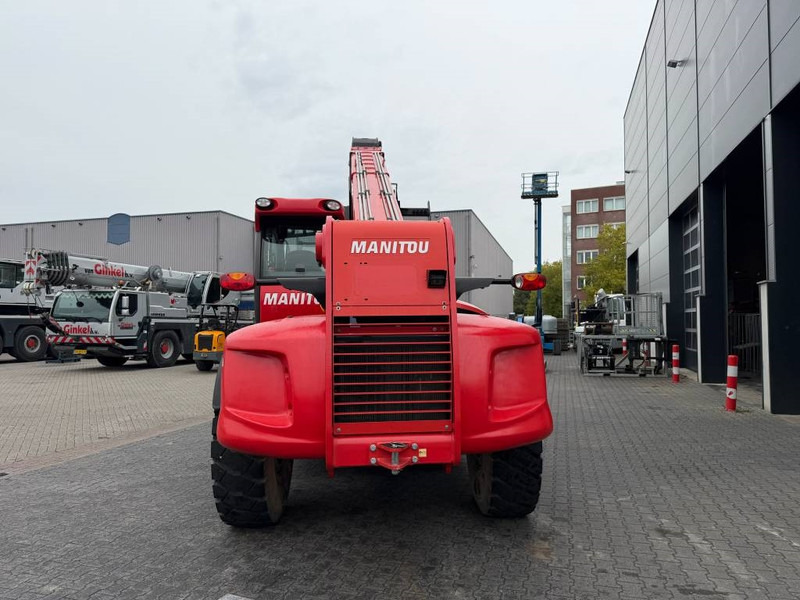 Manitou MHT 10180 - Телескопичен товарач: снимка 3 Manitou MHT 10180 - Телескопичен товарач: снимка 3