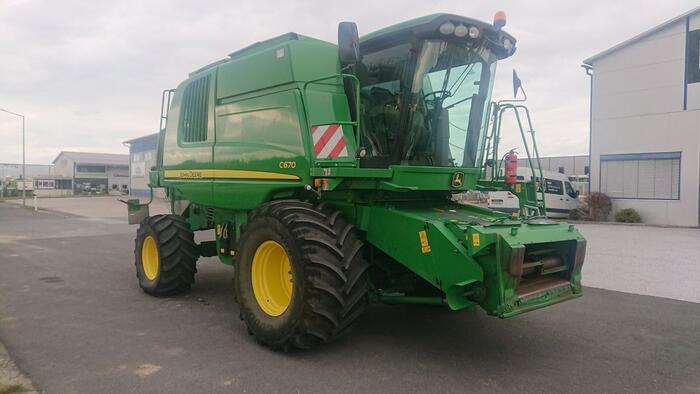 John Deere C 670 - Зърнокомбайн: снимка 1 John Deere C 670 - Зърнокомбайн: снимка 1