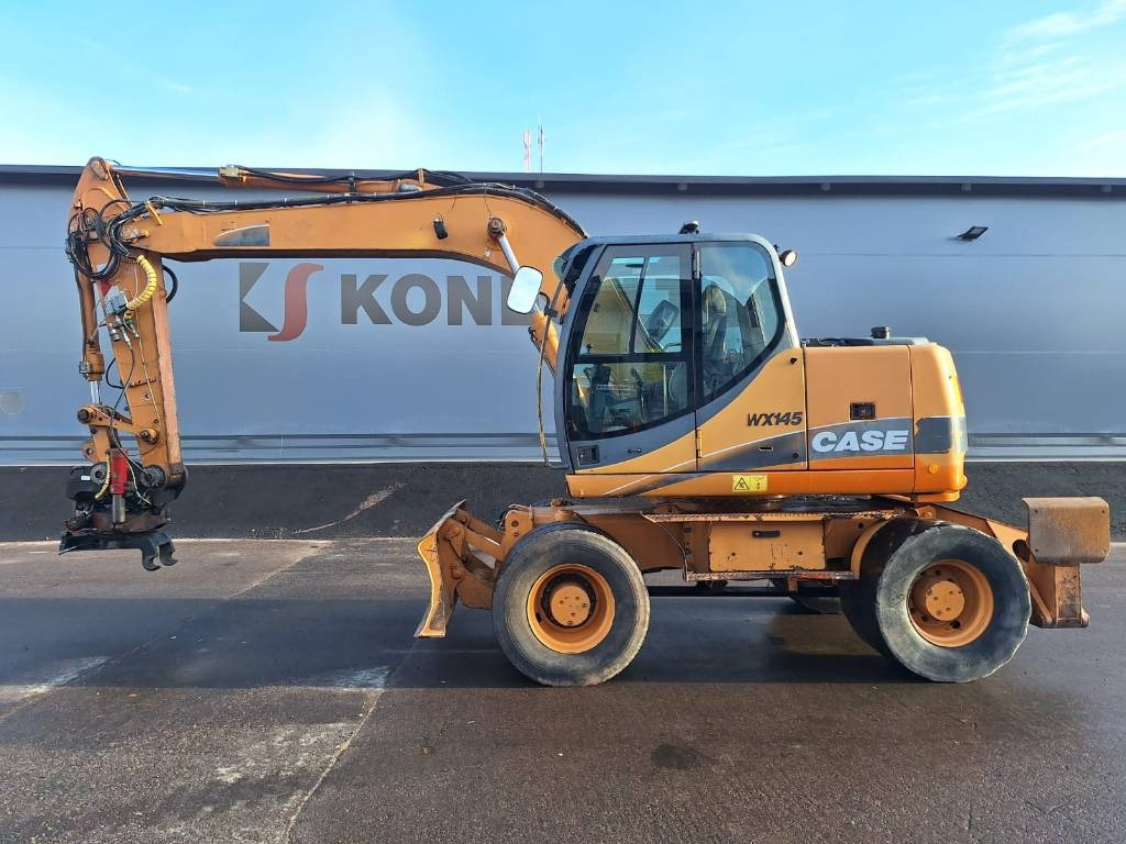 Case WX145 PYÖRITTÄJÄLLÄ  - Колесен багер: снимка 1 Case WX145 PYÖRITTÄJÄLLÄ  - Колесен багер: снимка 1