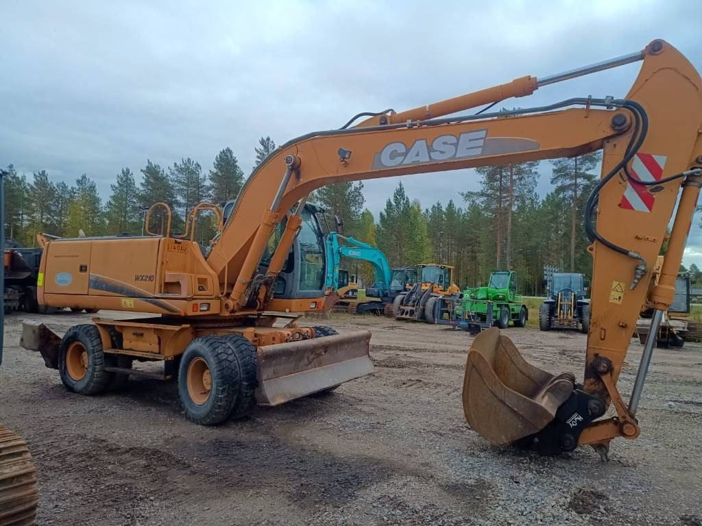 Case WX210 PYÖRITTÄJÄLLÄ - Колесен багер: снимка 5 Case WX210 PYÖRITTÄJÄLLÄ - Колесен багер: снимка 5