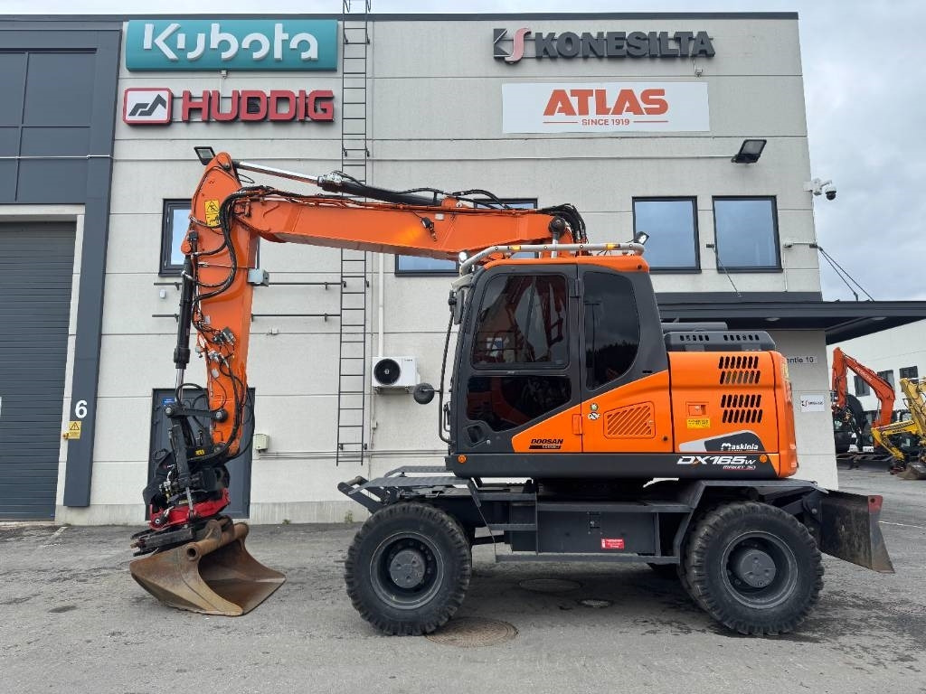 Doosan DX 165 W-5 - Колесен багер: снимка 1 Doosan DX 165 W-5 - Колесен багер: снимка 1