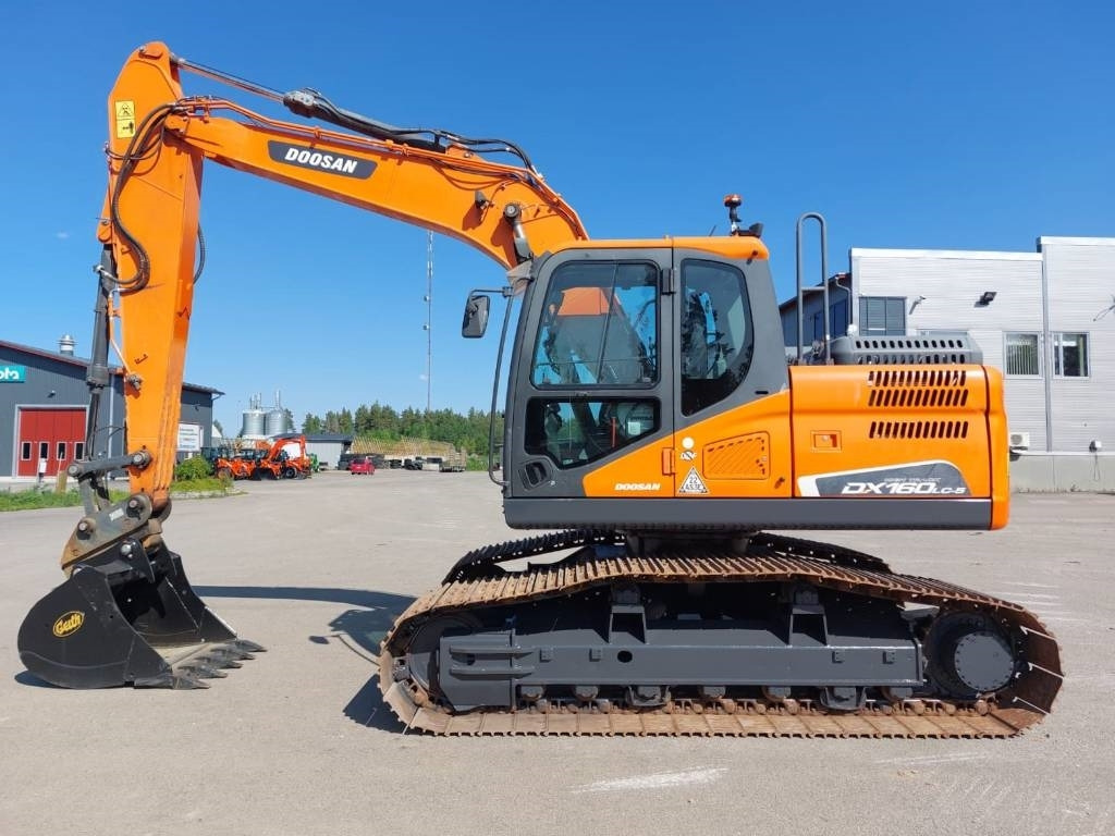 Doosan DX160LCH-5 METSÄALUSTA - Верижен багер: снимка 1 Doosan DX160LCH-5 METSÄALUSTA - Верижен багер: снимка 1