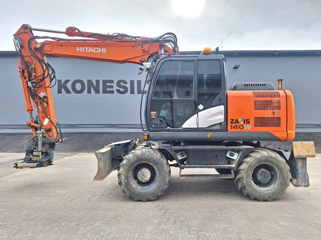 Hitachi ZX140W-5 HUIPPUVARUSTEET - Колесен багер: снимка 1 Hitachi ZX140W-5 HUIPPUVARUSTEET - Колесен багер: снимка 1