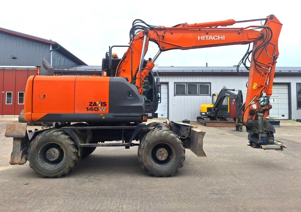 Hitachi ZX140W-5 HUIPPUVARUSTEET - Колесен багер: снимка 5 Hitachi ZX140W-5 HUIPPUVARUSTEET - Колесен багер: снимка 5