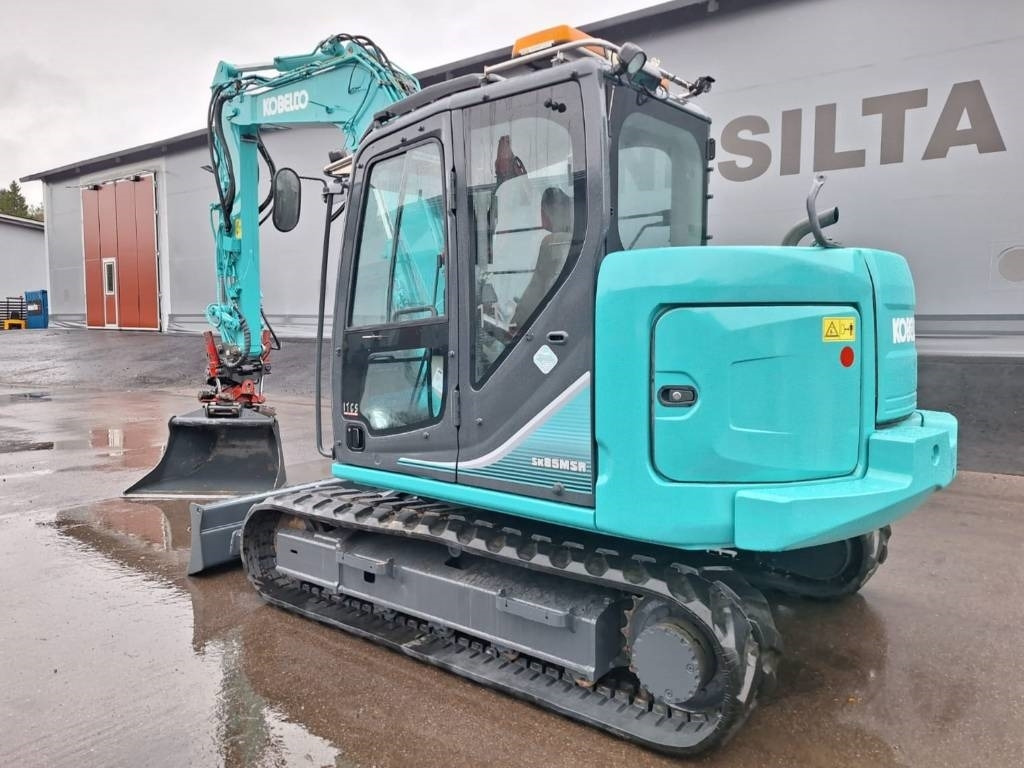 Kobelco SK85MSR-3 PYÖRITTÄJÄLLÄ - Мини багер: снимка 2 Kobelco SK85MSR-3 PYÖRITTÄJÄLLÄ - Мини багер: снимка 2