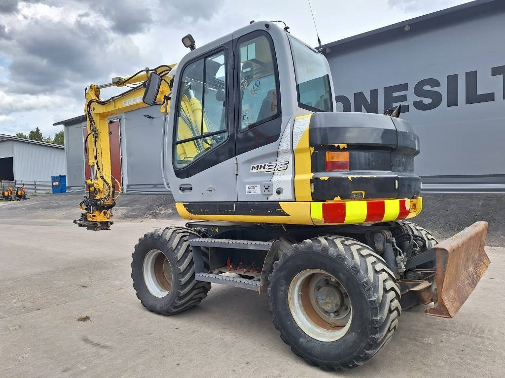 New Holland MYYTY! SOLD! MH2.6 ENGCON PIHDEILLÄ - Колесен багер: снимка 2 New Holland MYYTY! SOLD! MH2.6 ENGCON PIHDEILLÄ - Колесен багер: снимка 2
