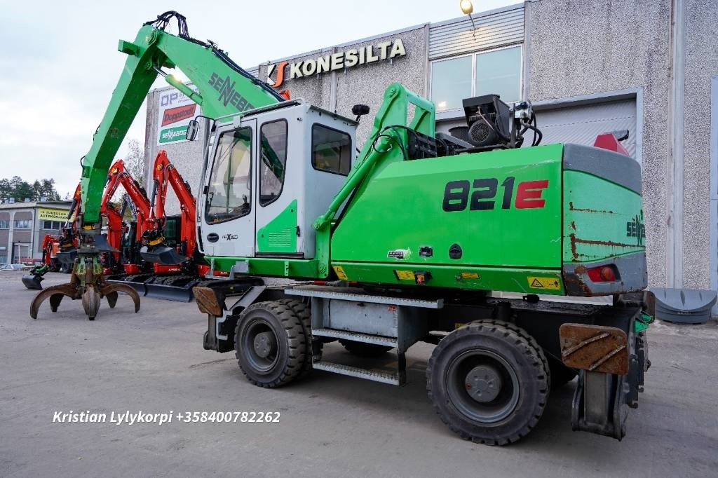 Sennebogen 821E SIPULIKOURA - Багер за манипулиране на материали: снимка 2 Sennebogen 821E SIPULIKOURA - Багер за манипулиране на материали: снимка 2
