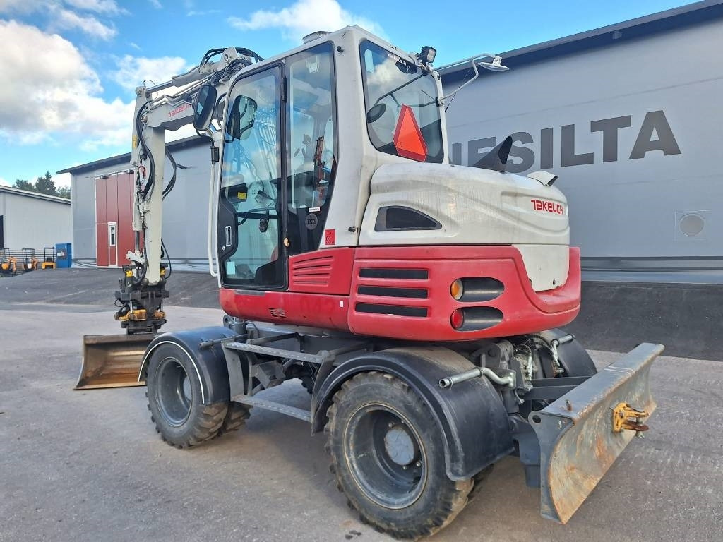 Takeuchi TB295W PYÖRITTÄJÄLLÄ - Колесен багер: снимка 2 Takeuchi TB295W PYÖRITTÄJÄLLÄ - Колесен багер: снимка 2