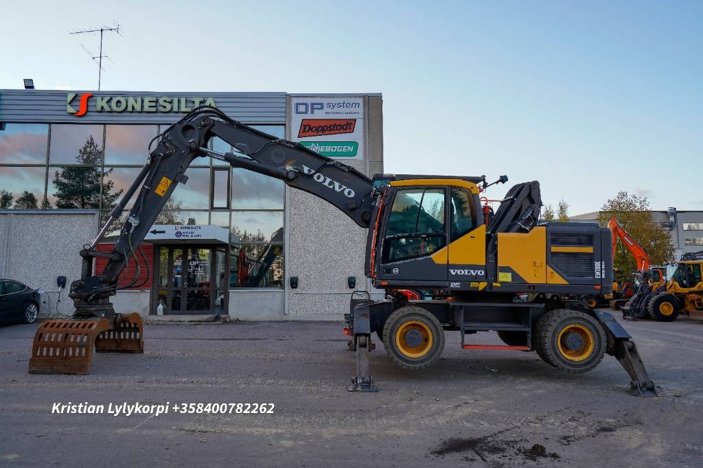 Volvo EW 200 E MH - Багер за манипулиране на материали: снимка 1 Volvo EW 200 E MH - Багер за манипулиране на материали: снимка 1