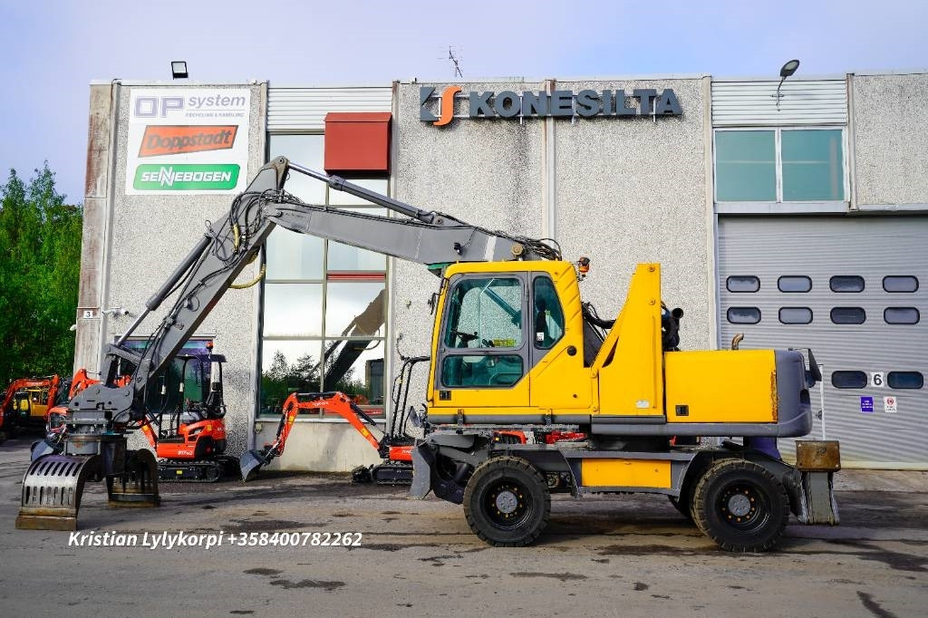 Багер за манипулиране на материали Volvo EW160B NOUSUHYTTI MATERIAALIKONE: снимка 1