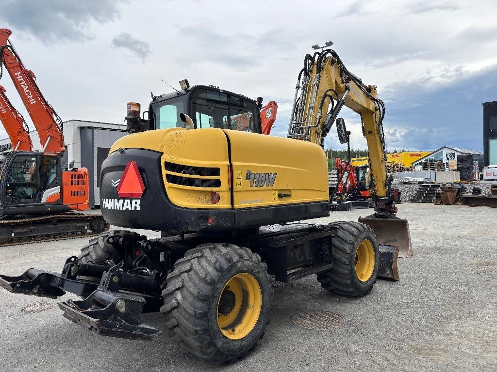 Yanmar B110W PYÖRITTÄJÄLLÄ  - Колесен багер: снимка 4 Yanmar B110W PYÖRITTÄJÄLLÄ  - Колесен багер: снимка 4