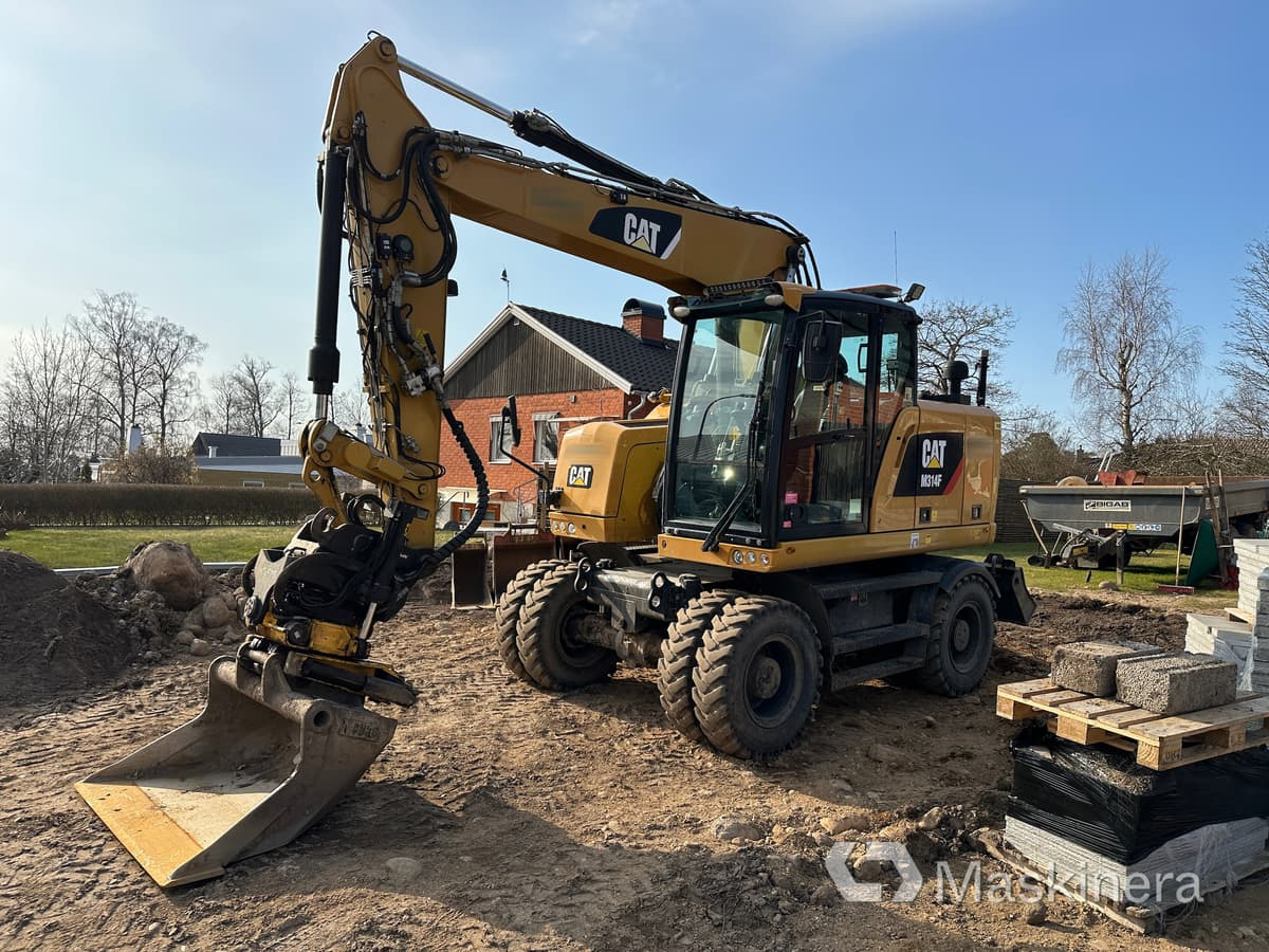 Hjulgrävare Cat M314F + redskap/vagn/grävsystem - Верижен багер: снимка 1 Hjulgrävare Cat M314F + redskap/vagn/grävsystem - Верижен багер: снимка 1
