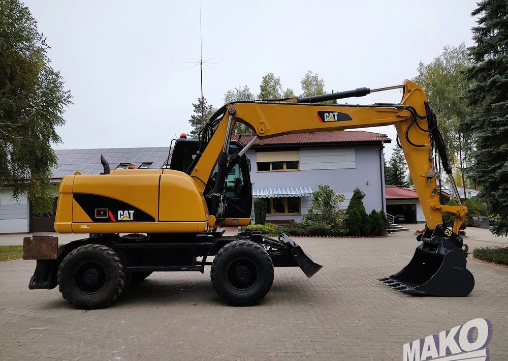 Caterpillar M313D - Колесен багер: снимка 5 Caterpillar M313D - Колесен багер: снимка 5