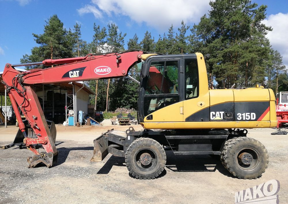 Caterpillar M315 C - Колесен багер: снимка 2 Caterpillar M315 C - Колесен багер: снимка 2
