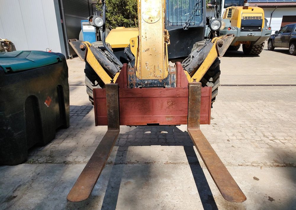 Caterpillar TH417 - Телескопичен товарач: снимка 3 Caterpillar TH417 - Телескопичен товарач: снимка 3